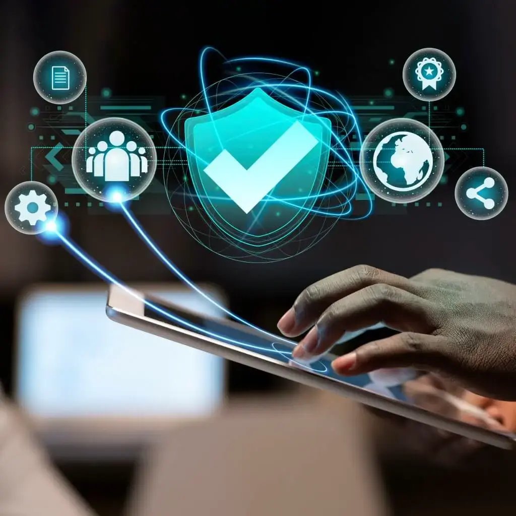 Person using a tablet with digital security icons floating above