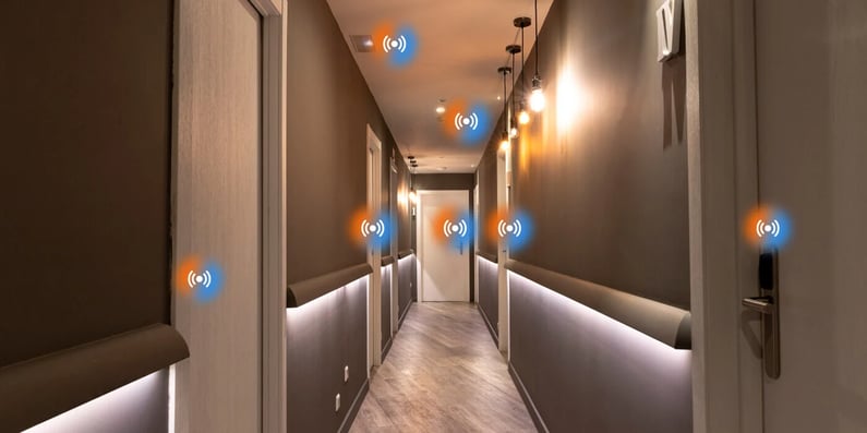 Smart hotel hallway with connected devices like smart door locks and lighting