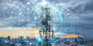 Telecommunication tower with a digital data network overlay against a city skyline