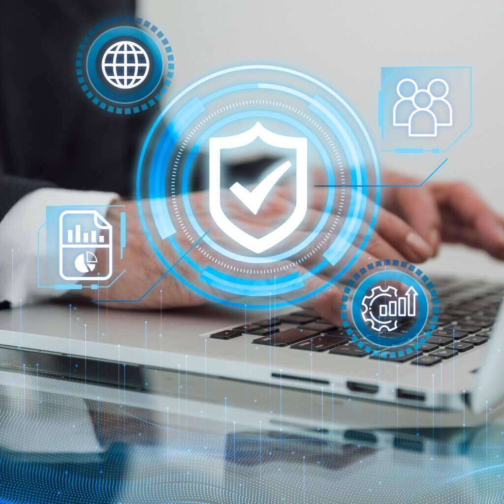 Person typing on a laptop with security and data icons overlayed