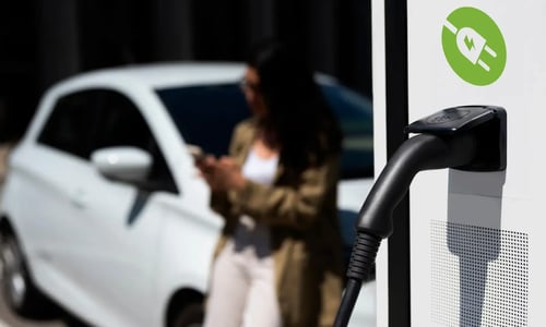 EV charging connector plugged into a charging station