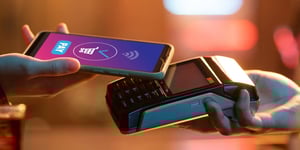 Phone making a contactless payment on a card terminal