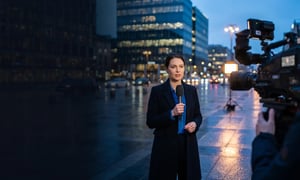 Reporter delivering a live broadcast from the field